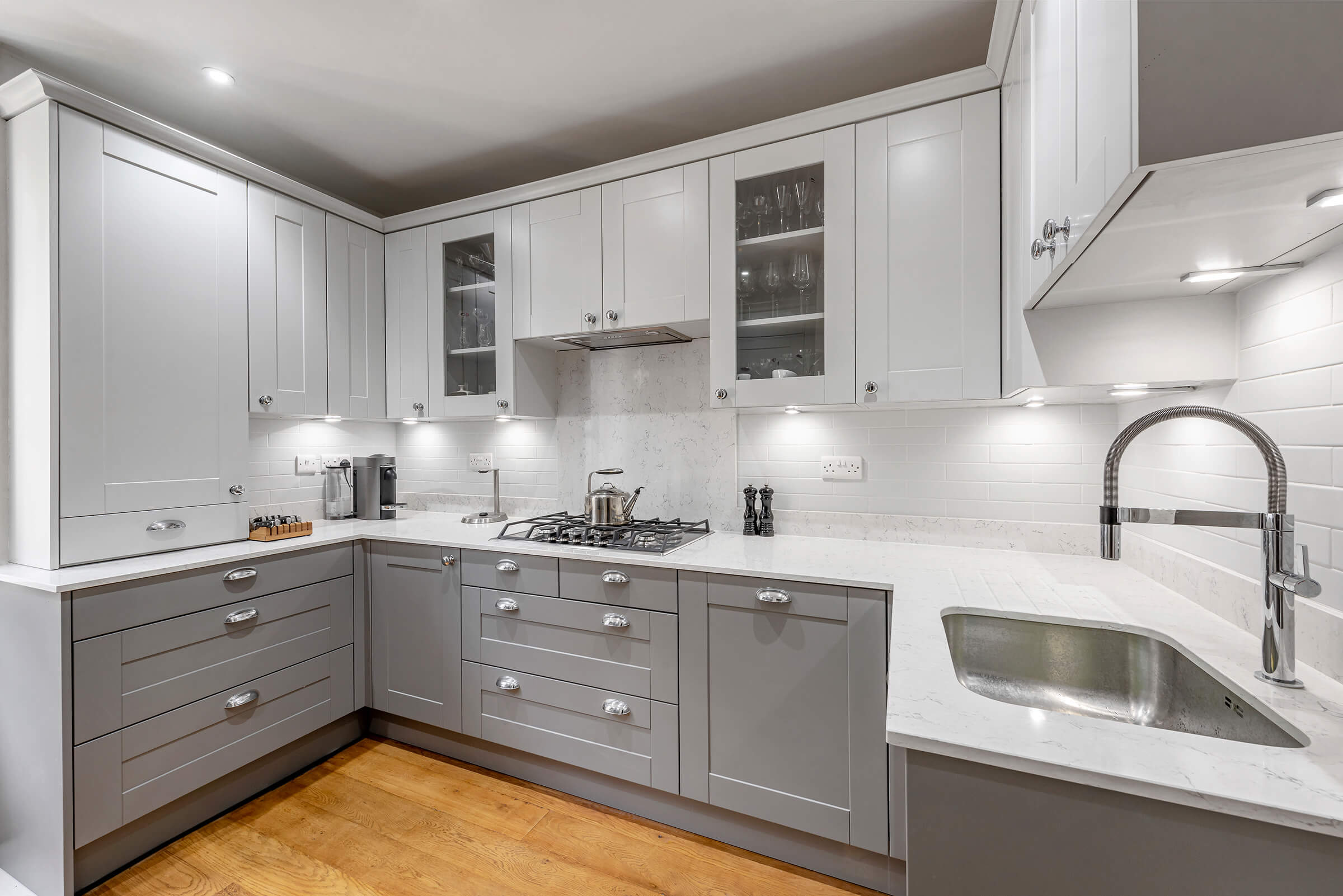 Elegant Kitchen Design: Classic Shaker-Style Kitchen with Light Grey and Grey Cabinets