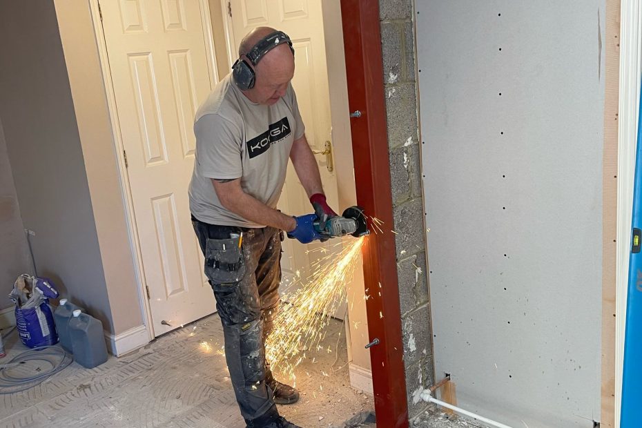 Kitchen fitter working on a new kitchen installation in Bristol home